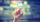 Hand pressing an email icon on blurred cityscape background